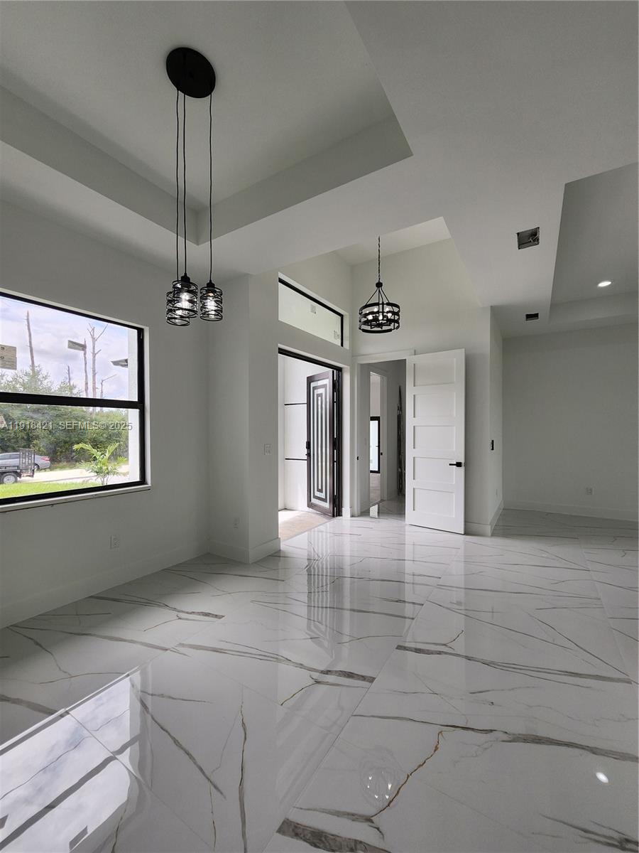 3302 East 18th Street, Unit ST Lehigh Acres, FL 33972 - Photo 14 of 34 a view of livingroom and window