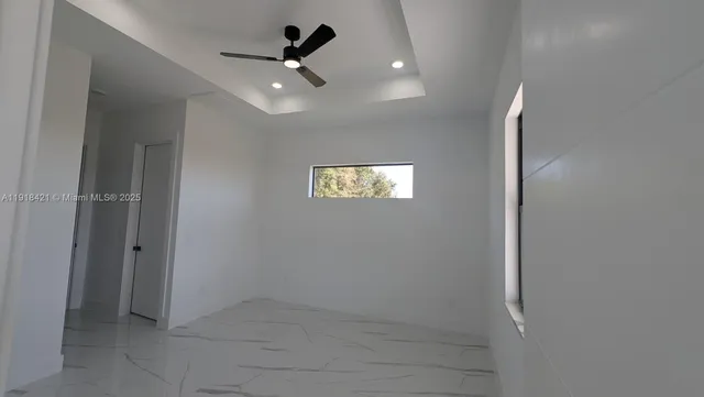 a bathroom with a toilet sink and shower