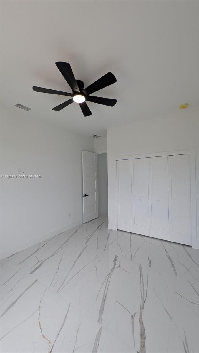 3302 East 18th Street, Unit ST Lehigh Acres, FL 33972 - Photo 25 of 34 a view of an empty room