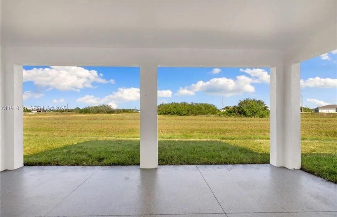 3302 East 18th Street, Unit ST Lehigh Acres, FL 33972 - Photo 34 of 34 a view of a city from a big room