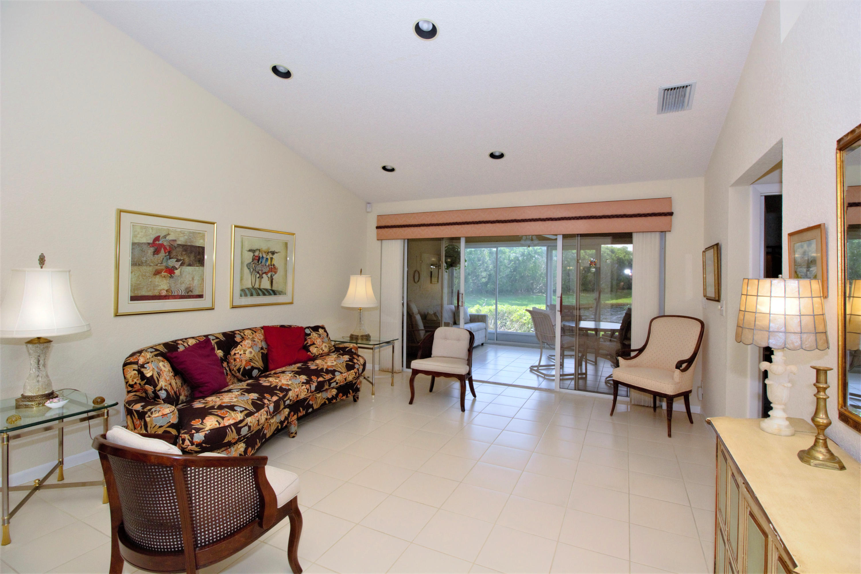 7933 Sandy Pointe Drive Delray Beach, FL 33446 - Photo 16 of 42 LIVING TO FLORIDA ROOM