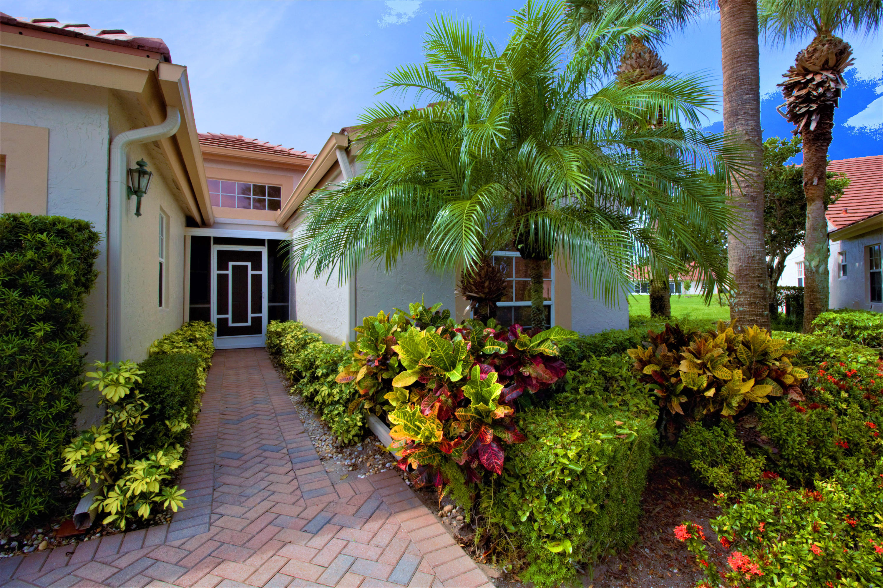 7933 Sandy Pointe Drive Delray Beach, FL 33446 - Photo 2 of 42 FRONT ENTRANCE TO VILLA