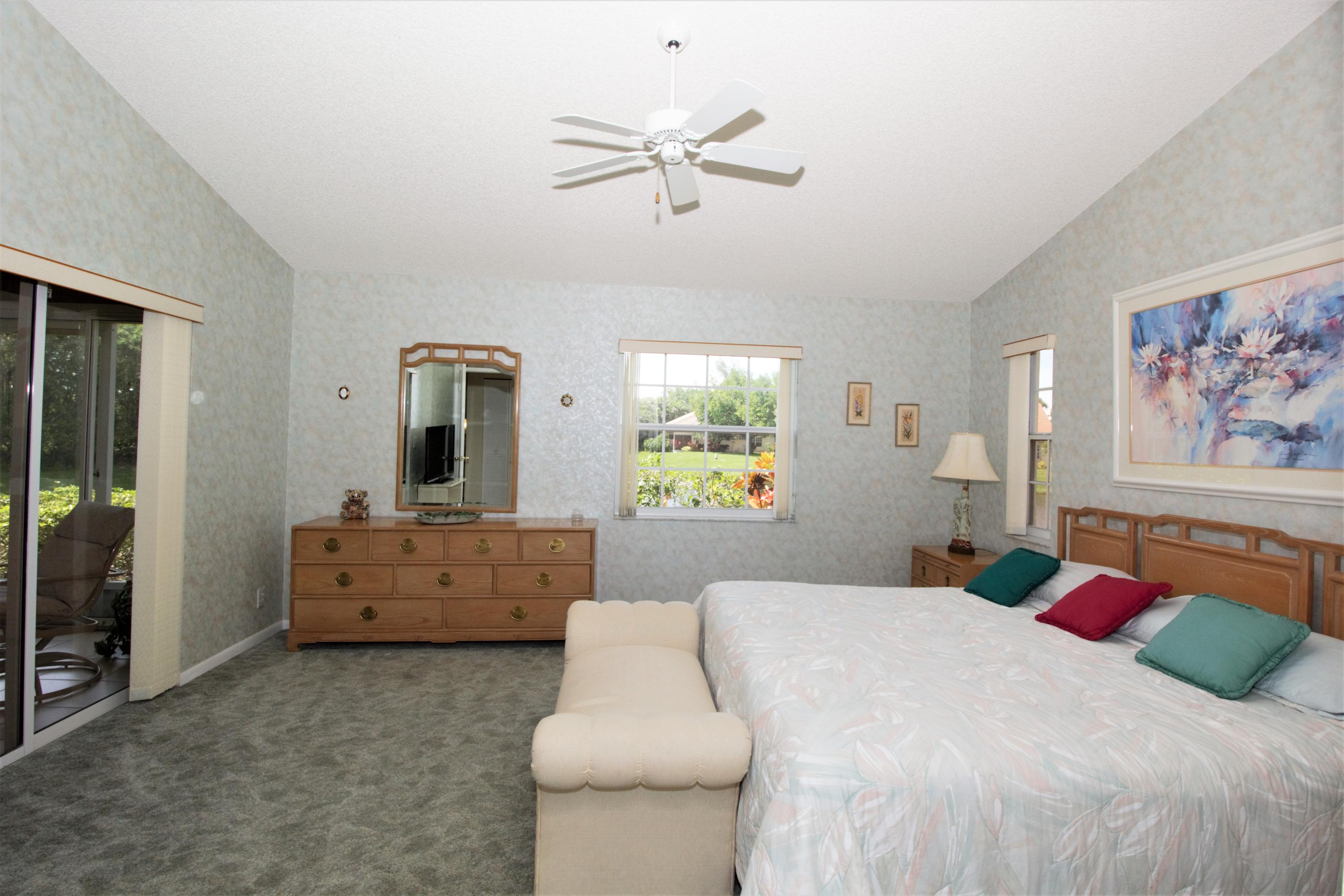 7933 Sandy Pointe Drive Delray Beach, FL 33446 - Photo 21 of 42 MASTER BEDROOM