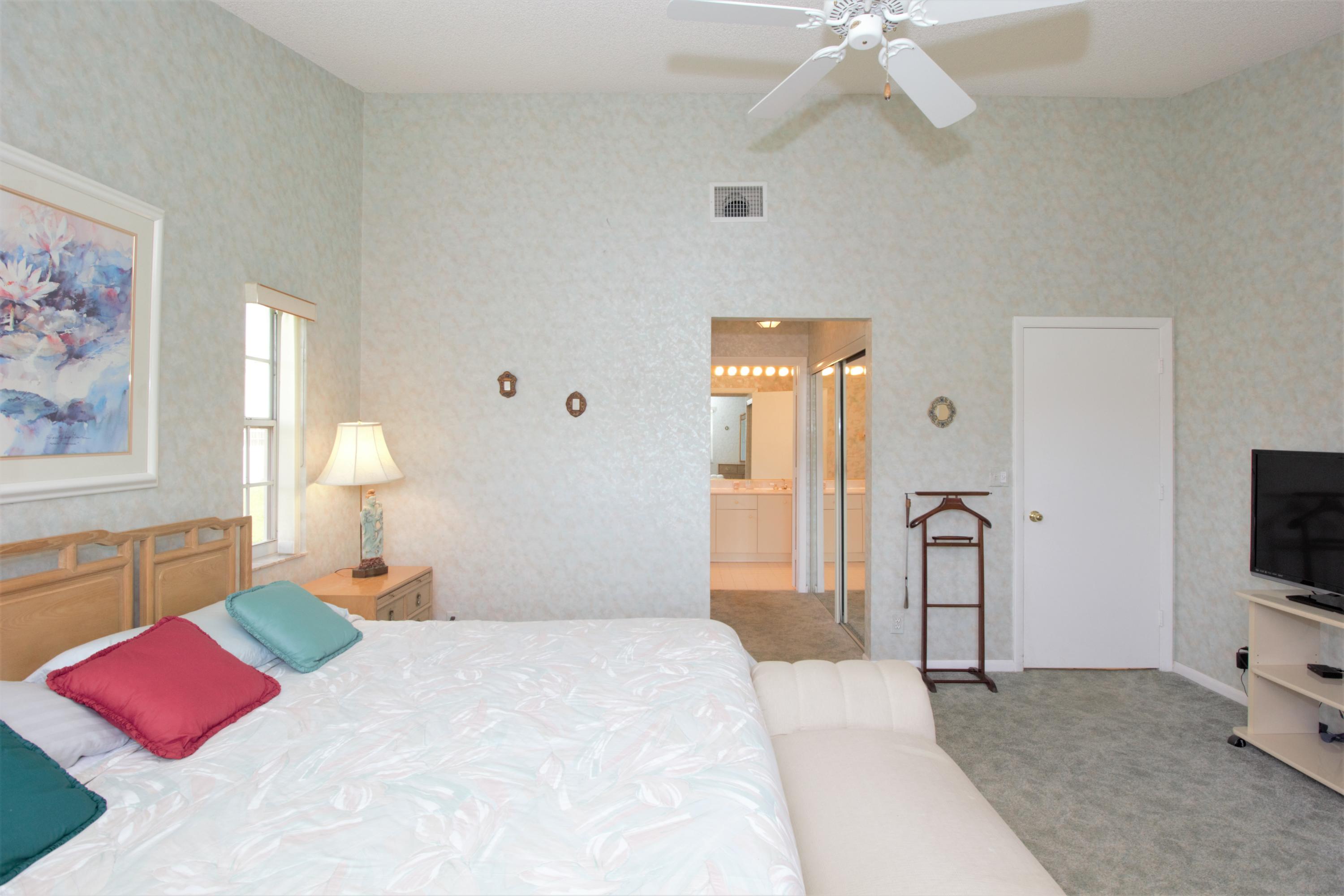 7933 Sandy Pointe Drive Delray Beach, FL 33446 - Photo 24 of 42 MASTER BEDROOM