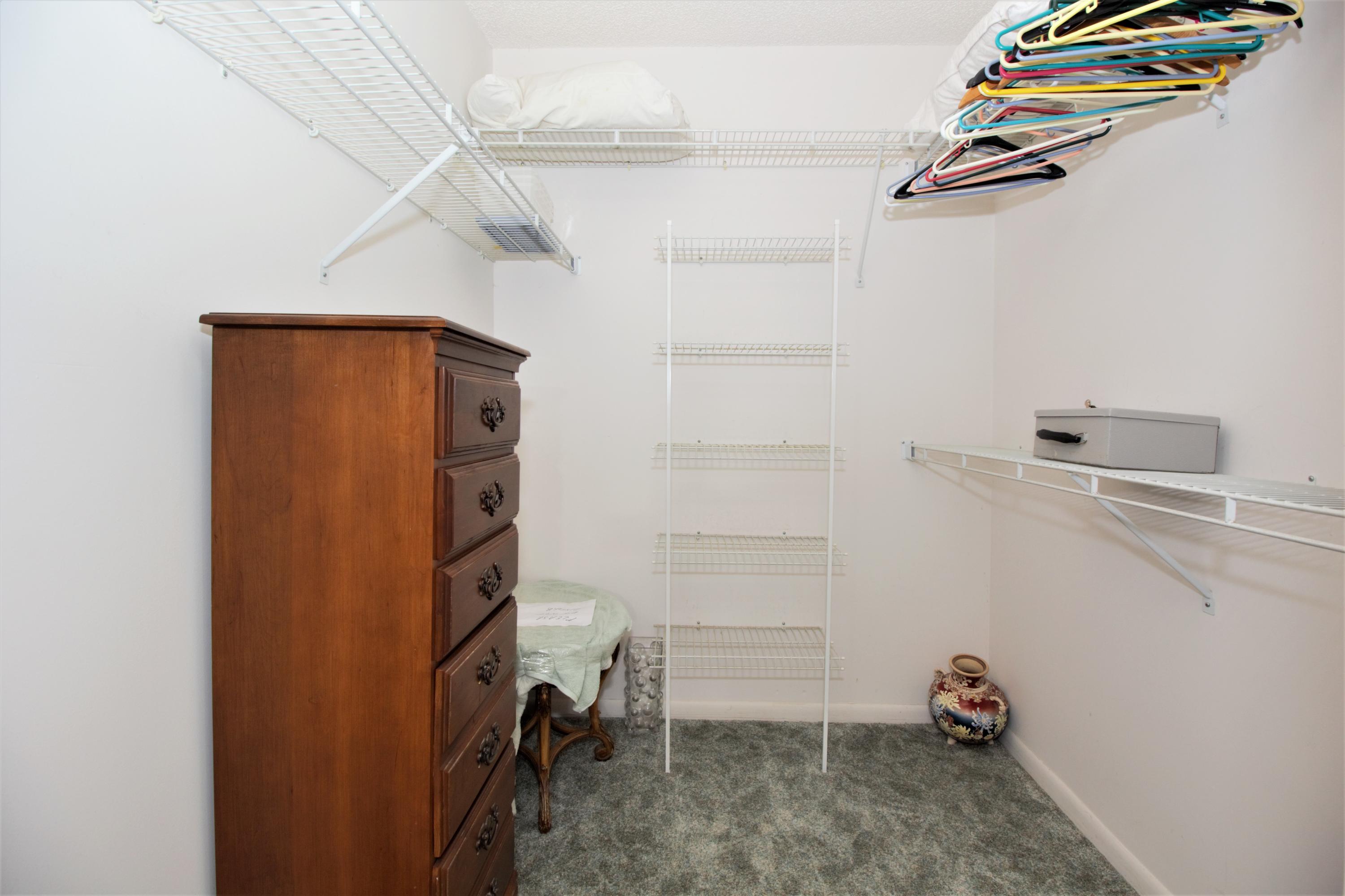 7933 Sandy Pointe Drive Delray Beach, FL 33446 - Photo 25 of 42 MASTER WALK-IN CLOSET