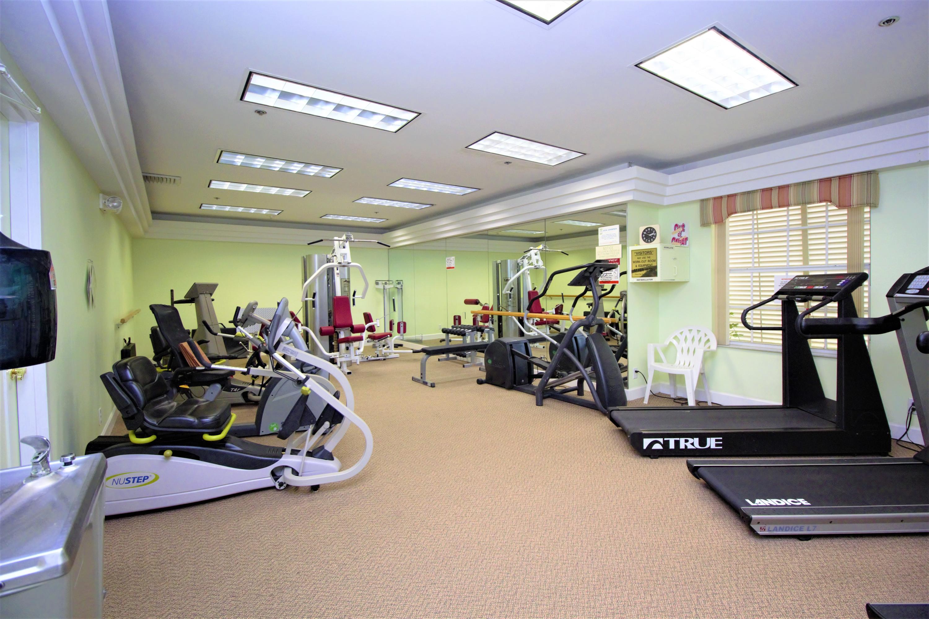 7933 Sandy Pointe Drive Delray Beach, FL 33446 - Photo 40 of 42 Cardio Room