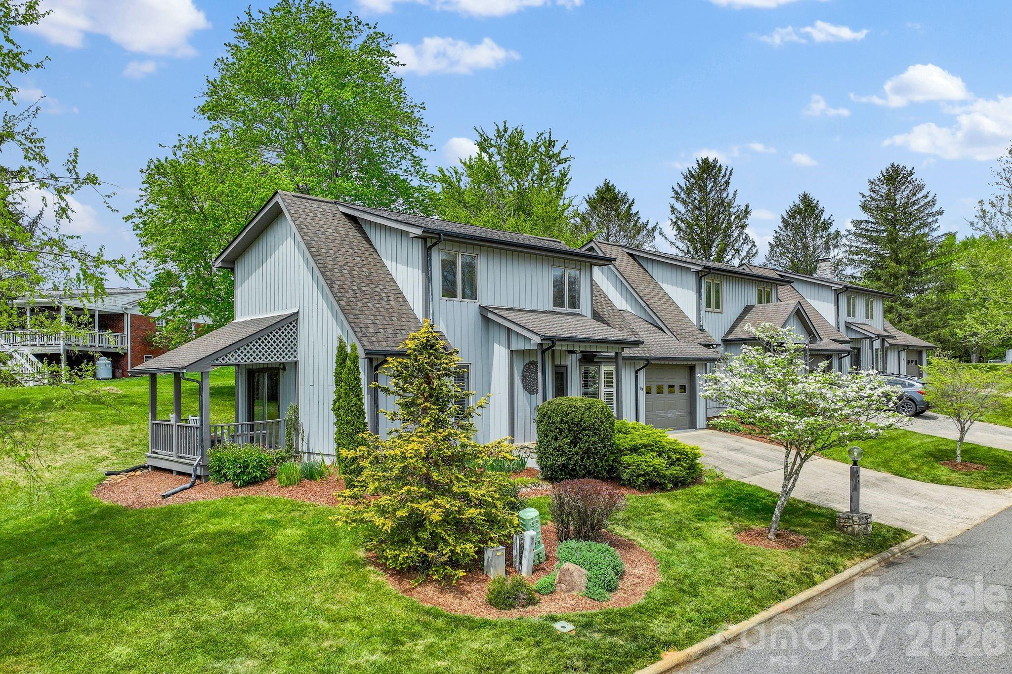 108 Kyfields Weaverville, NC 28787 - Photo 1 of 32 a front view of a house with a yard