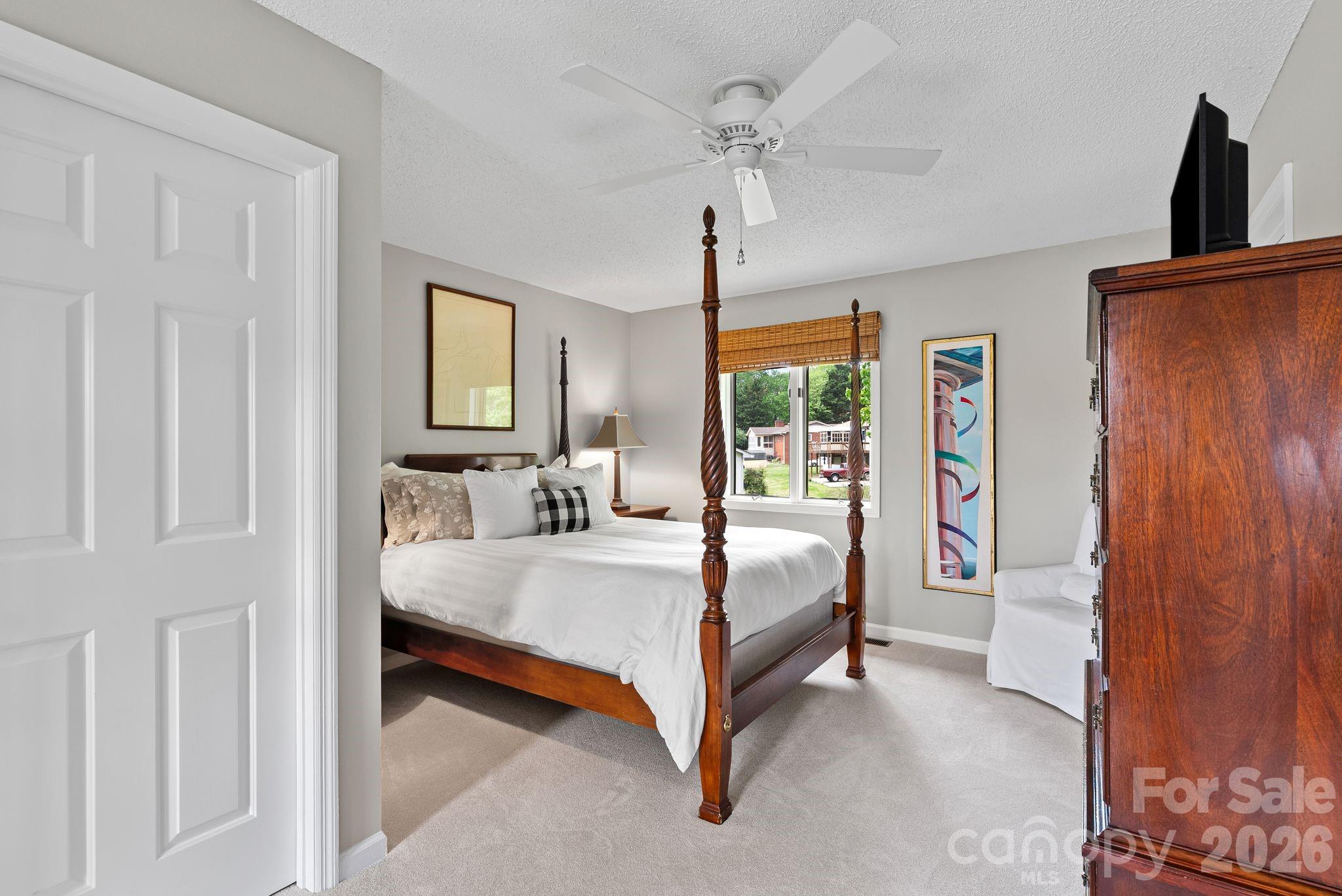 108 Kyfields Weaverville, NC 28787 - Photo 12 of 32 a bed room with a bed and a window