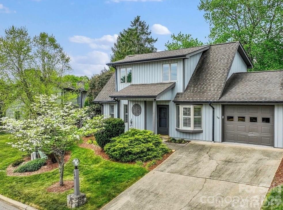 108 Kyfields Weaverville, NC 28787 - Photo 2 of 32 a front view of a house with a garden