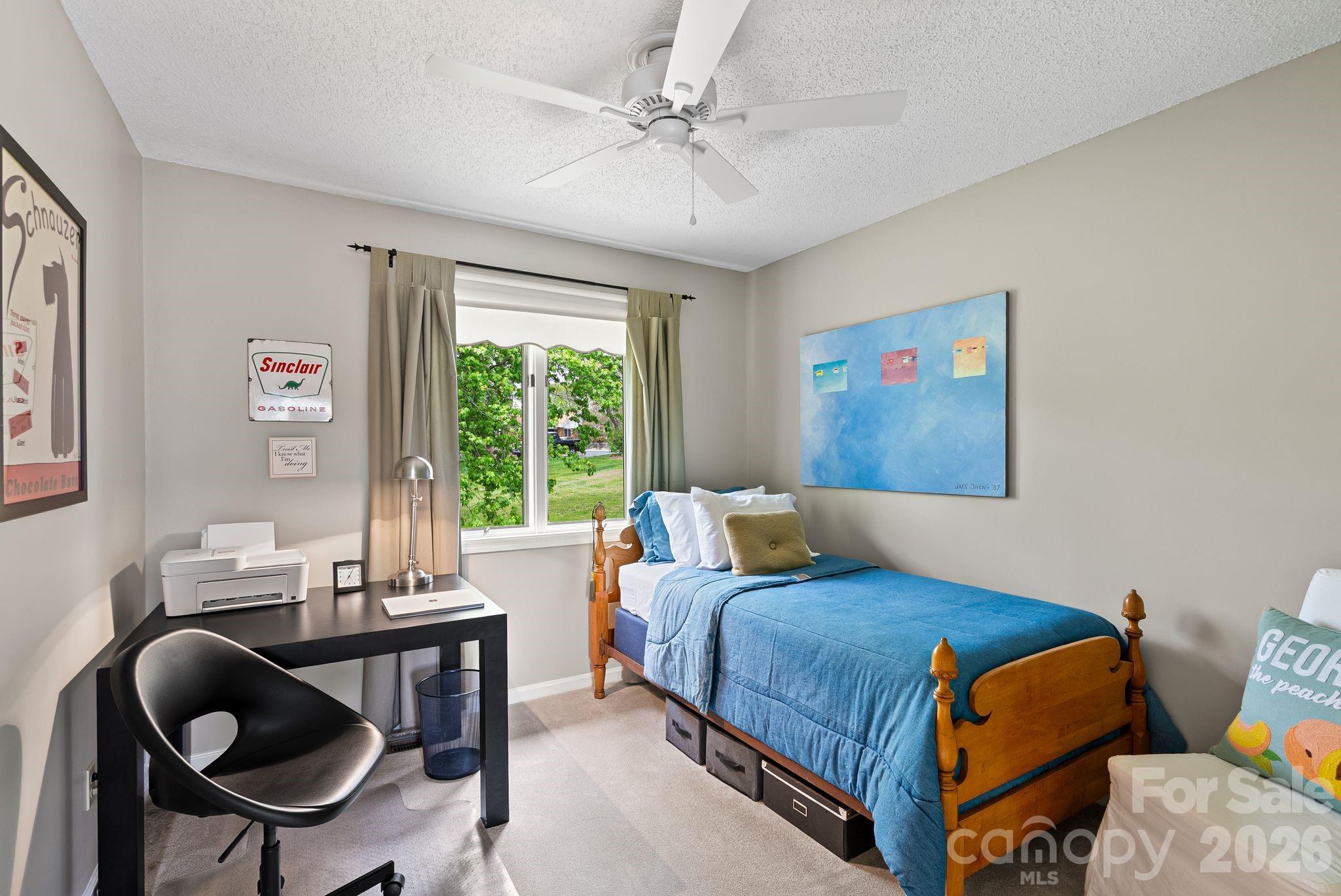 108 Kyfields Weaverville, NC 28787 - Photo 21 of 32 a bedroom with a bed and a window