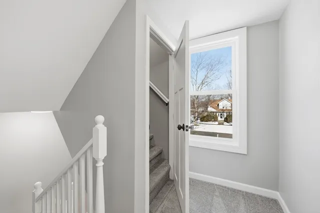 a view of a room that has a window in it