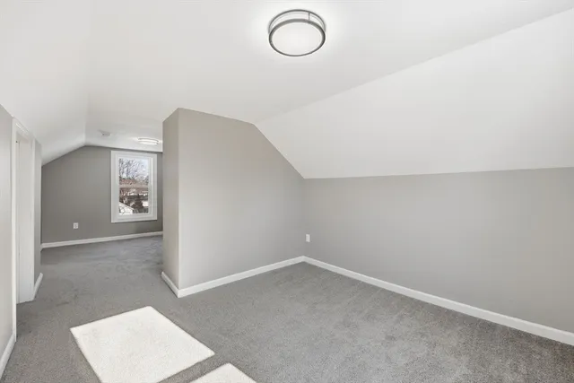 a front view of a house with a garage