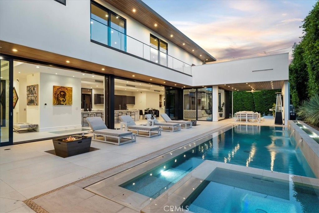 1210 Morningside Way Venice, CA 90291 - Photo 34 of 61 a view of a patio with dining table and chairs with wooden floor