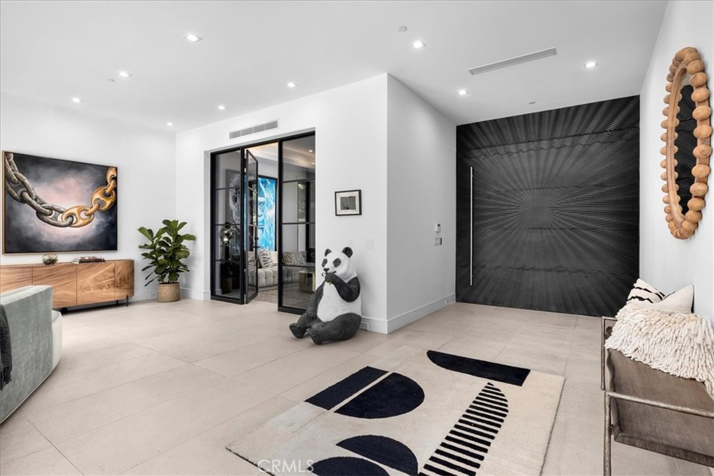 1210 Morningside Way Venice, CA 90291 - Photo 6 of 61 a bedroom with furniture and a rug