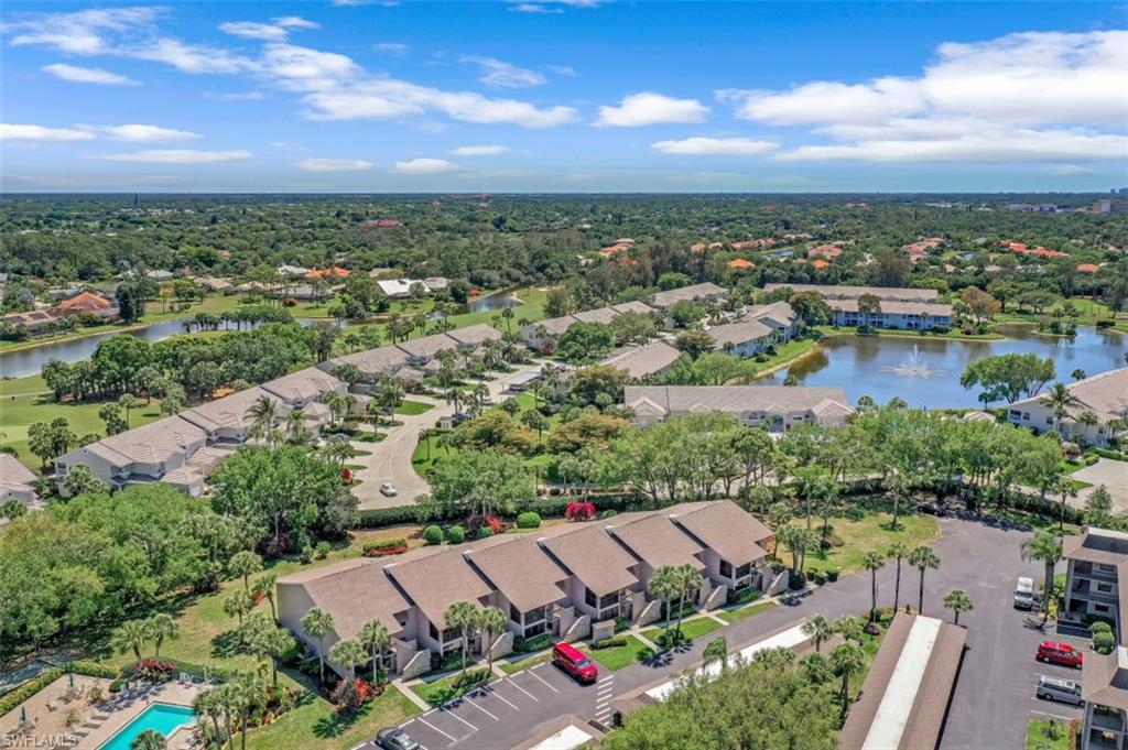 1782 Imperial Golf Course Boulevard, Unit C104 Naples, FL 34110 - Photo 28 of 34 an aerial view of a city