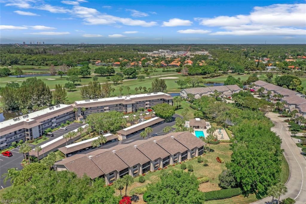 1782 Imperial Golf Course Boulevard, Unit C104 Naples, FL 34110 - Photo 30 of 34 a view of a city with a lake