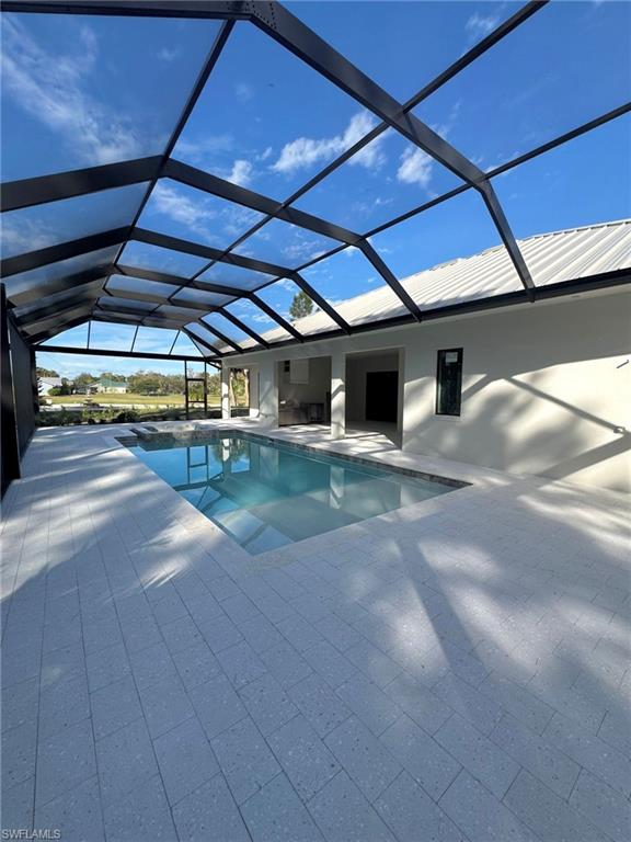 1109 15th Street Southwest Naples, FL 34117 - Photo 4 of 4 a view of a garage with wooden table