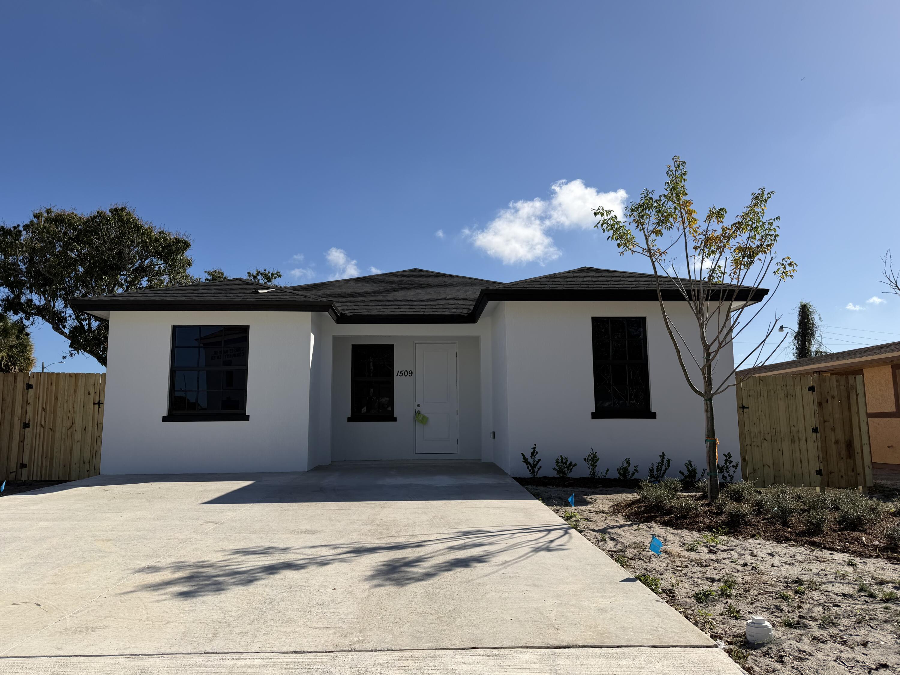 1509 West 28th Street Riviera Beach, FL 33404 - Photo 1 of 20 1509 W 28th St