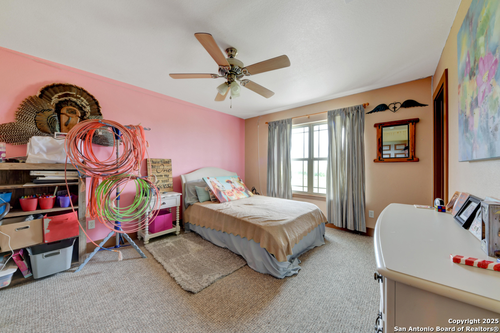 4190 Atkins Road Salado, TX 76571 - Photo 30 of 49 a bedroom with bed and window