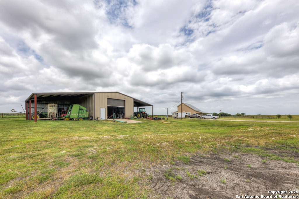 4190 Atkins Road Salado, TX 76571 - Photo 34 of 49 a view of a big house with a big yard and large trees