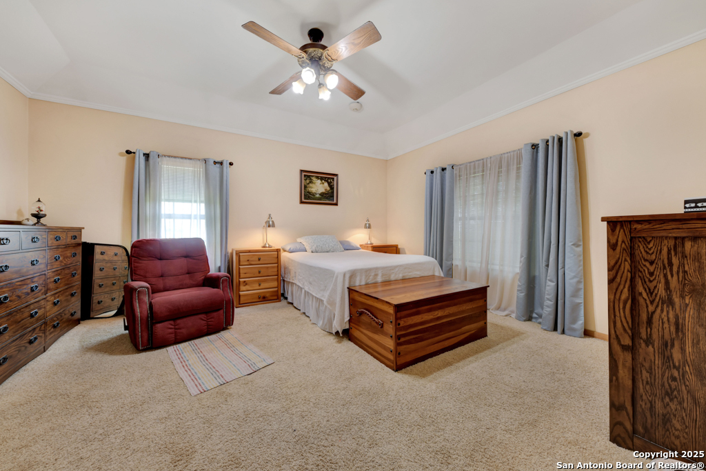 4190 Atkins Road Salado, TX 76571 - Photo 6 of 49 a bedroom with a bed and a couch