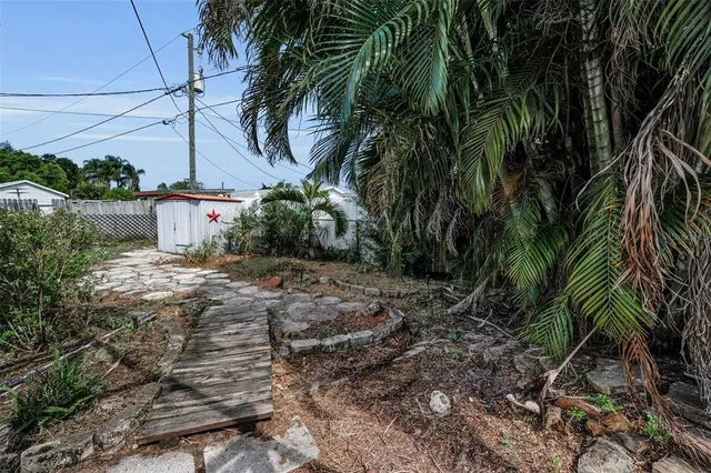 a backyard of a house with lots of green space