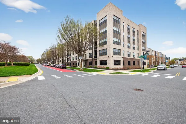 a tall building with view of street