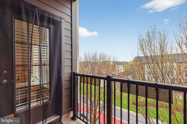 a view of a balcony with an outdoor space