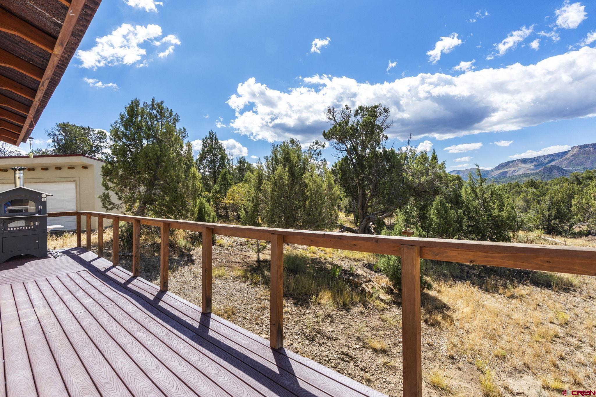 35510 Rd J.8 Mancos, CO 81328 - Photo 21 of 41 a view of a balcony with wooden floor