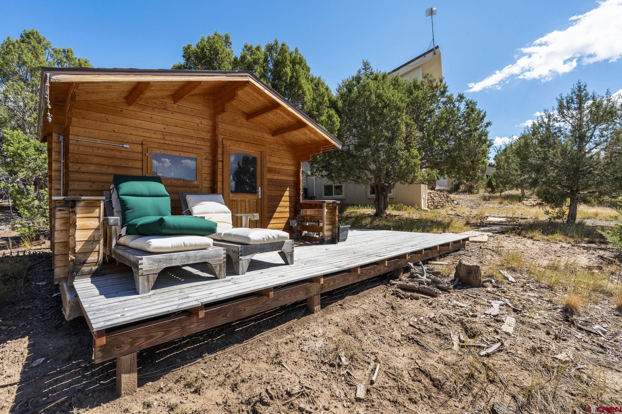 35510 Rd J.8 Mancos, CO 81328 - Photo 28 of 41 a view of a wooden chairs on the deck