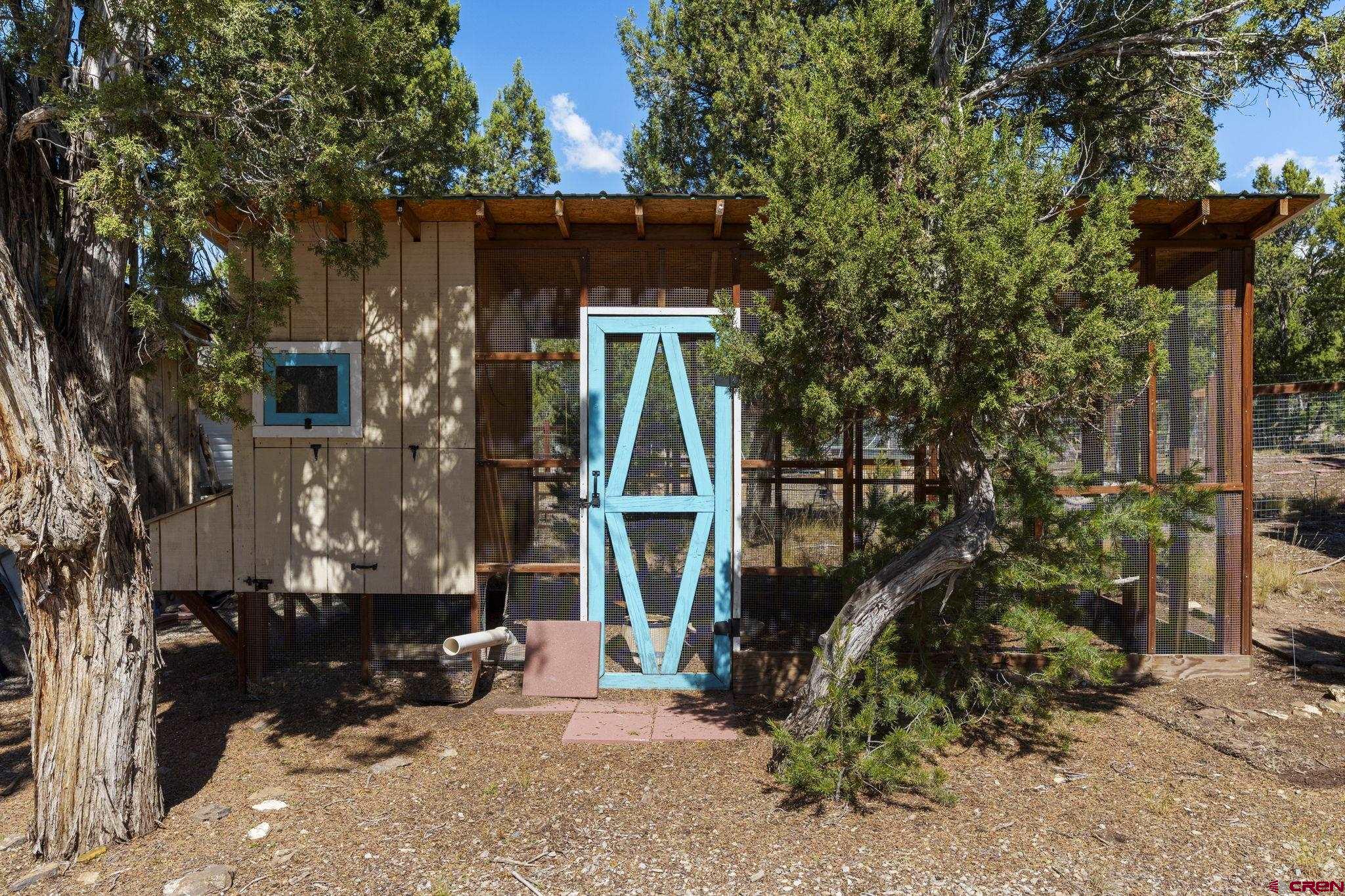 35510 Rd J.8 Mancos, CO 81328 - Photo 32 of 41 a view of house with a yard