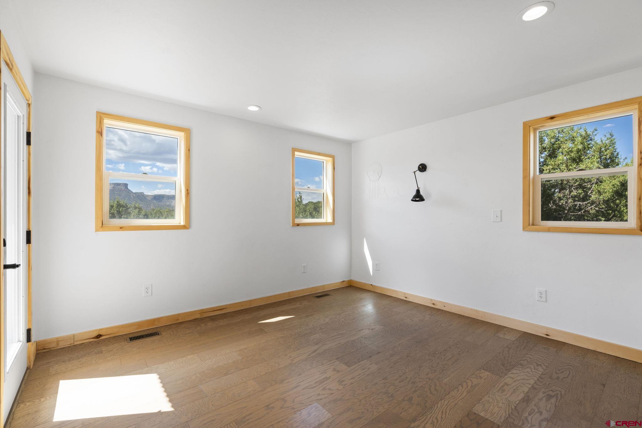 35510 Rd J.8 Mancos, CO 81328 - Photo 10 of 41 a view of an empty room with a window