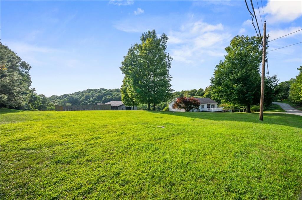 3766 North Balsiger Road Vandergrift, PA 15690 - Photo 29 of 34 a view of a field of grass and trees