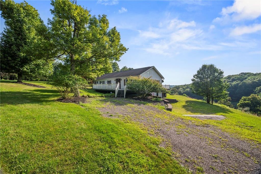 3766 North Balsiger Road Vandergrift, PA 15690 - Photo 33 of 34 a view of a house with swimming pool and a yard