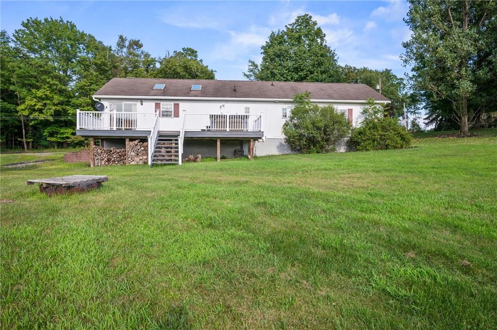 3766 North Balsiger Road Vandergrift, PA 15690 - Photo 34 of 34 a aerial view of a house with a yard table and chairs