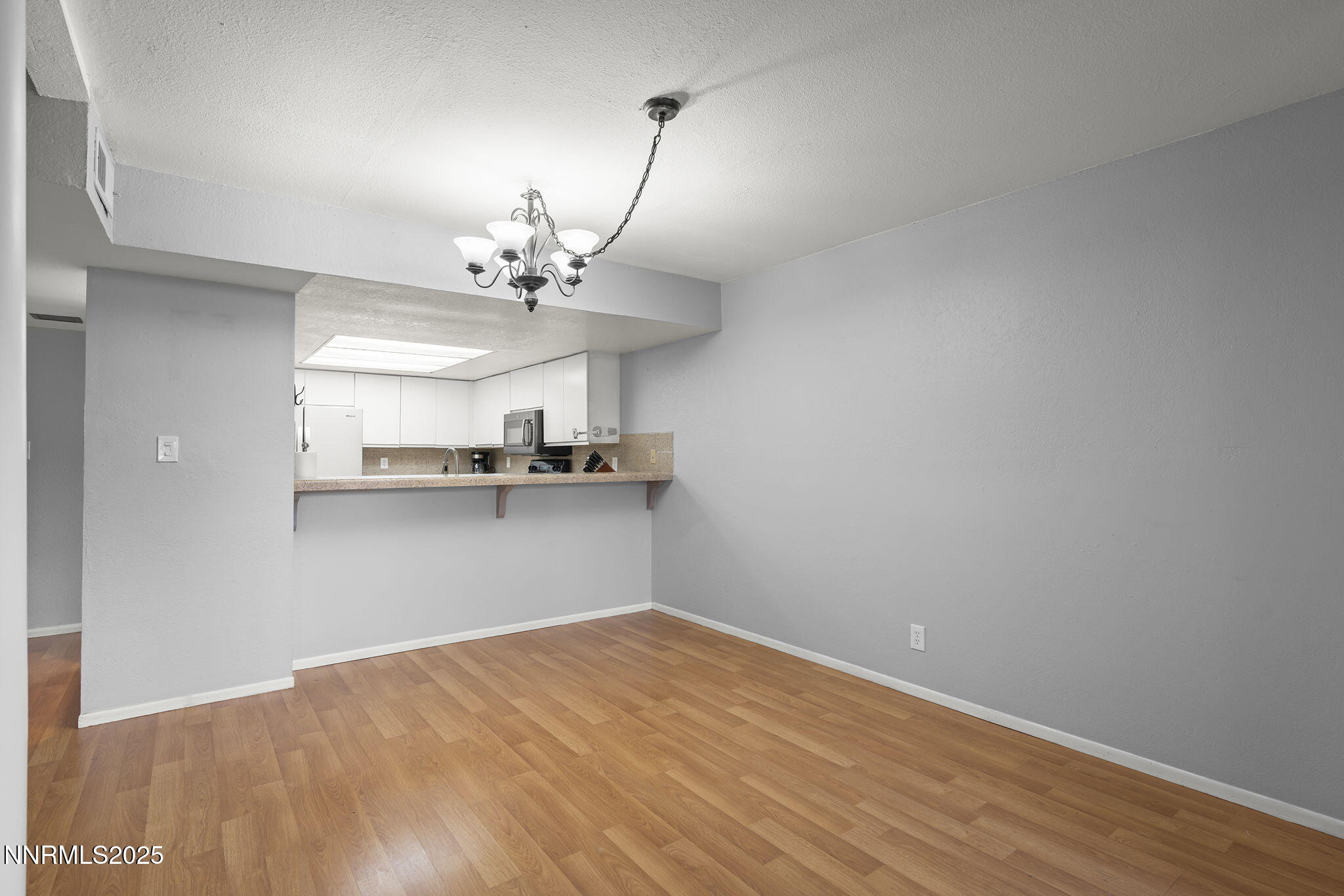 1023 Tyler Way Sparks, NV 89431 - Photo 11 of 21 a view of a kitchen with a sink and a window