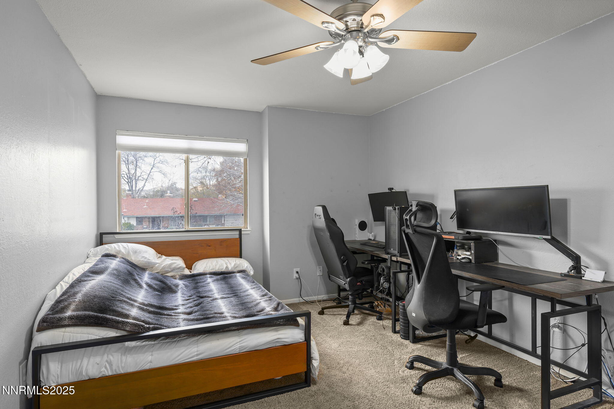 1023 Tyler Way Sparks, NV 89431 - Photo 15 of 21 a room with furniture and a window