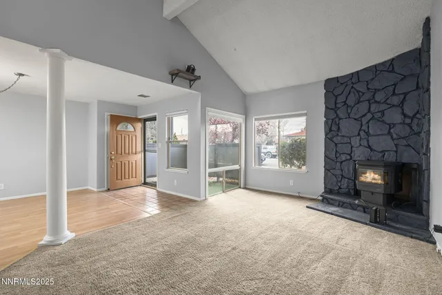 a view of a livingroom with a fireplace