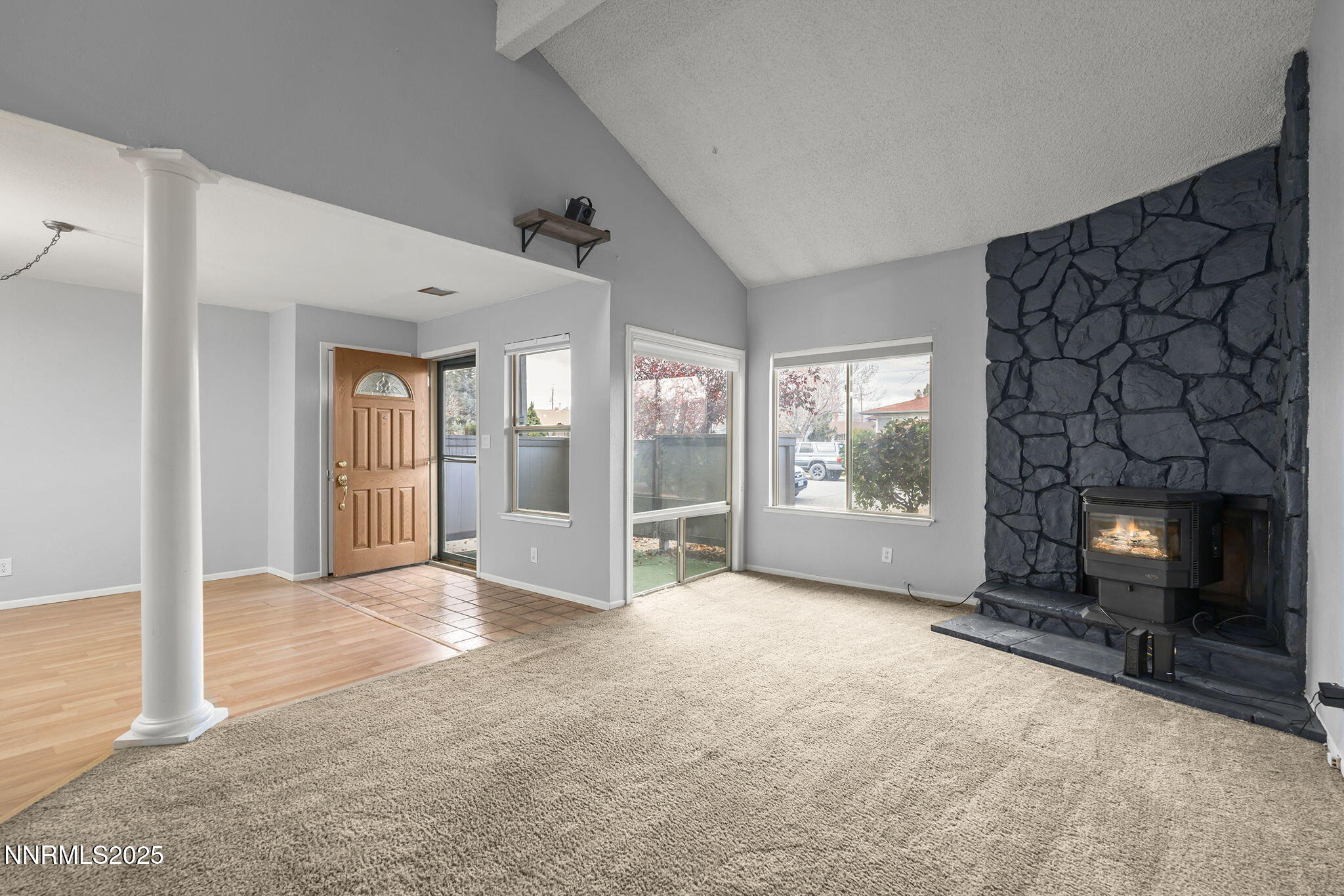 1023 Tyler Way Sparks, NV 89431 - Photo 5 of 21 a view of a livingroom with a fireplace