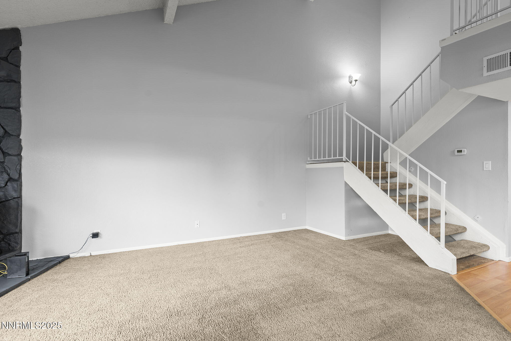 1023 Tyler Way Sparks, NV 89431 - Photo 7 of 21 a view of a hallway with staircase