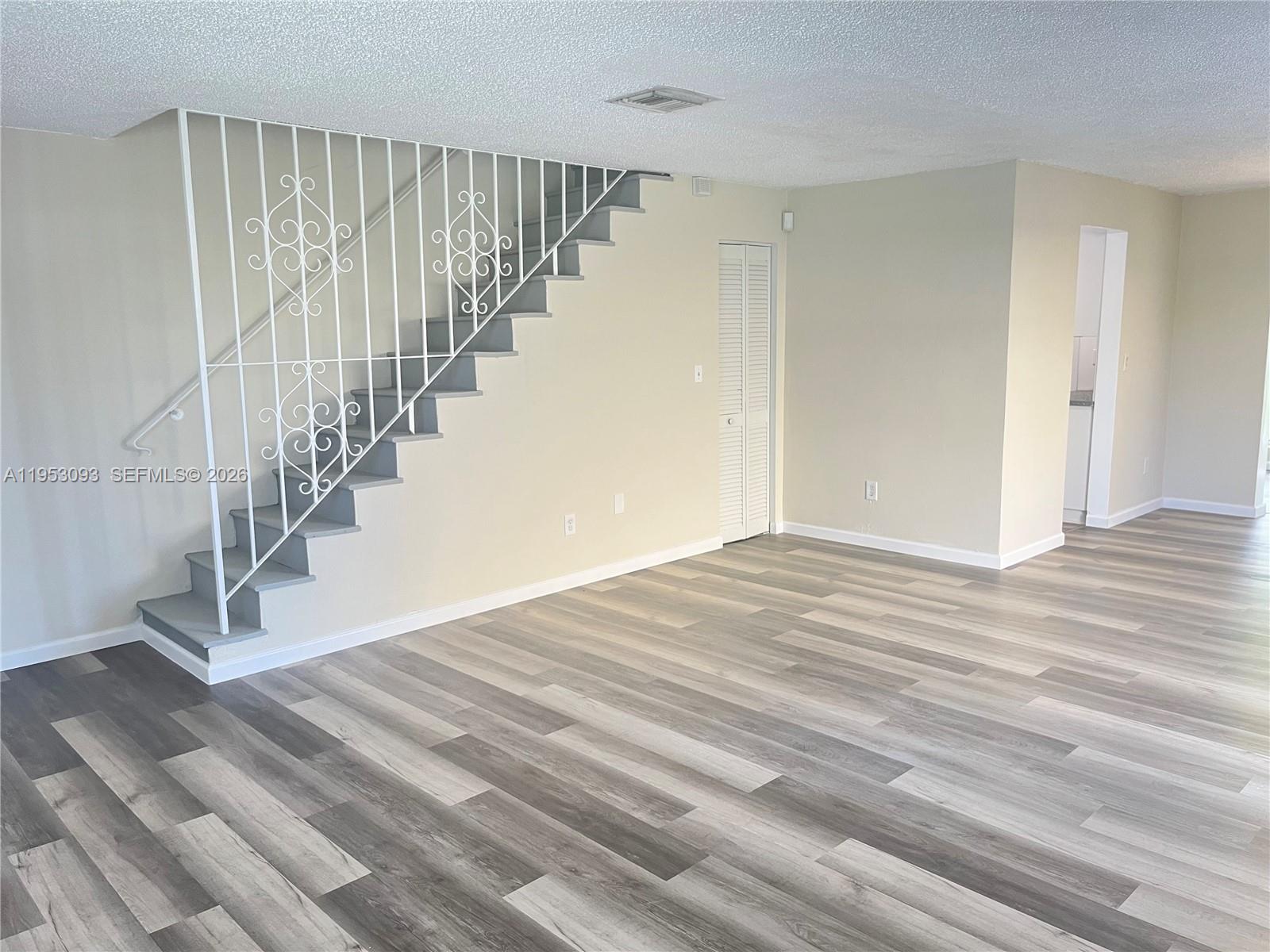 9503 Southwest 88th Terrace, Unit 9503 Miami, FL 33176 - Photo 3 of 15 a view of entryway with wooden floor