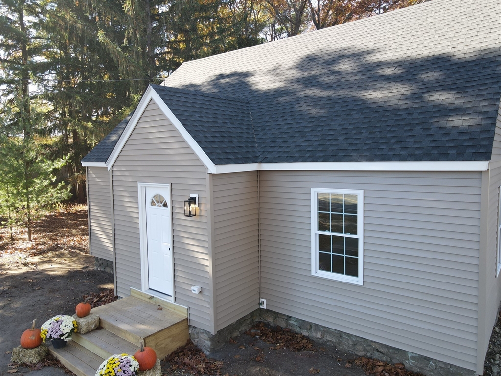28 Thompson Road Webster, MA 01570 - Photo 26 of 30 a backyard of a house