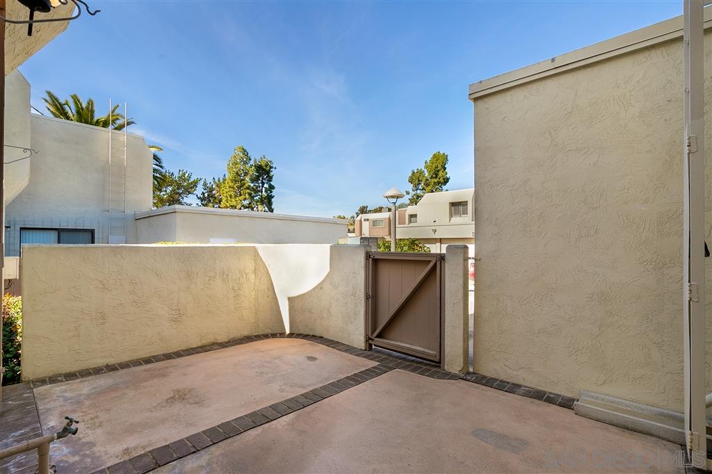 6369 Rancho Mission Road, Unit 2 San Diego, CA 92108 - Photo 11 of 24 Patio off the kitchen - leads direct to garage and carport