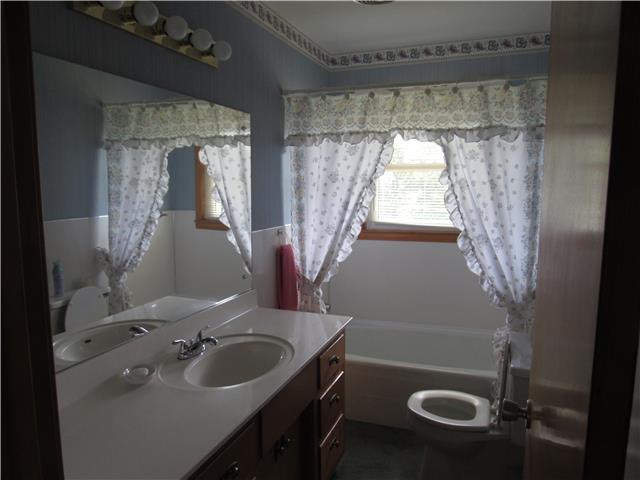 940 Steele Road Charlotte, TN 37036 - Photo 13 of 16 one of two bathrooms