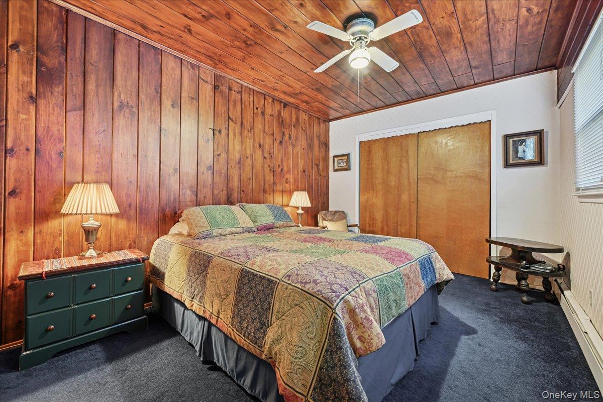 4 East Carpenter Street Valley Stream, NY 11580 - Photo 15 of 34 a bedroom with a bed and a window