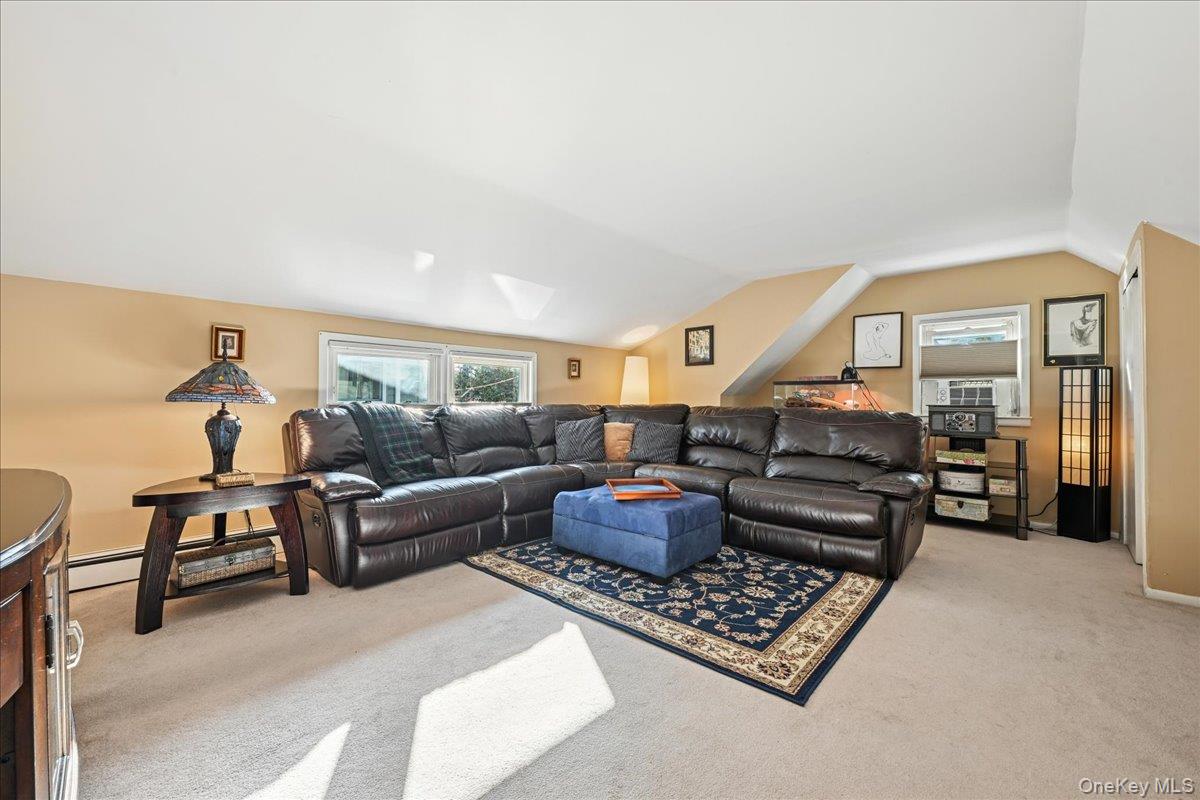 4 East Carpenter Street Valley Stream, NY 11580 - Photo 18 of 34 a living room with furniture rug and window
