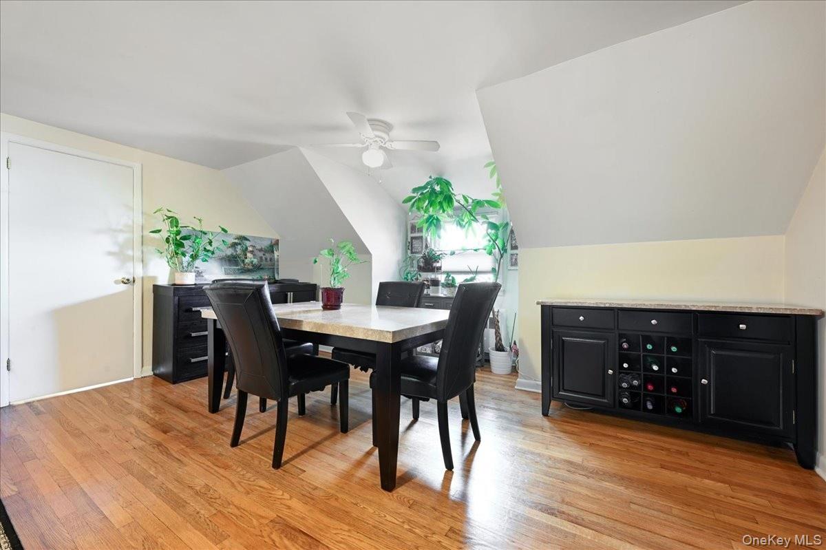 4 East Carpenter Street Valley Stream, NY 11580 - Photo 21 of 34 a view of a dining room with furniture and wooden floor