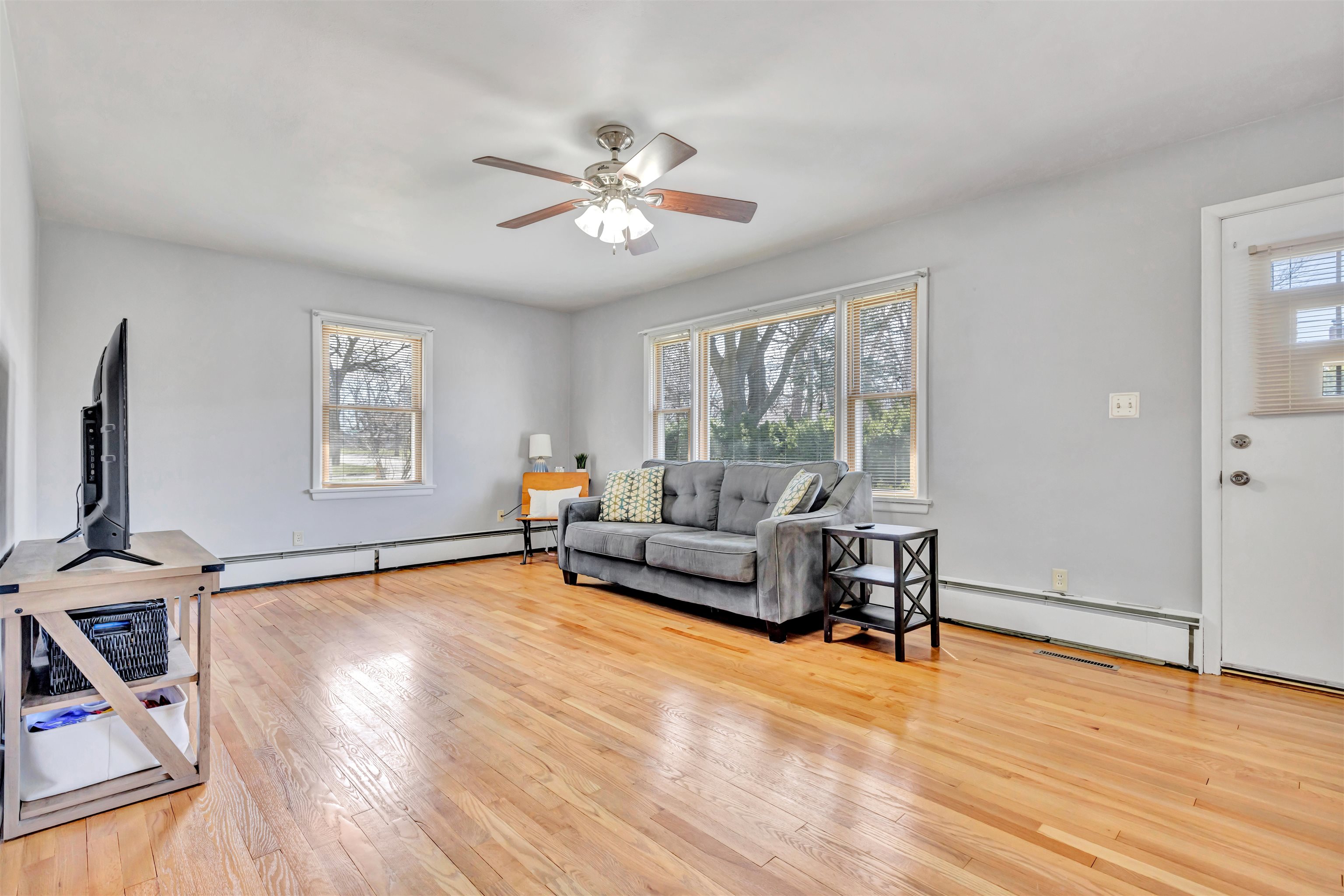 3620 Highcrest Road Rockford, IL 61107 - Photo 3 of 18 a living room with furniture and a flat screen tv