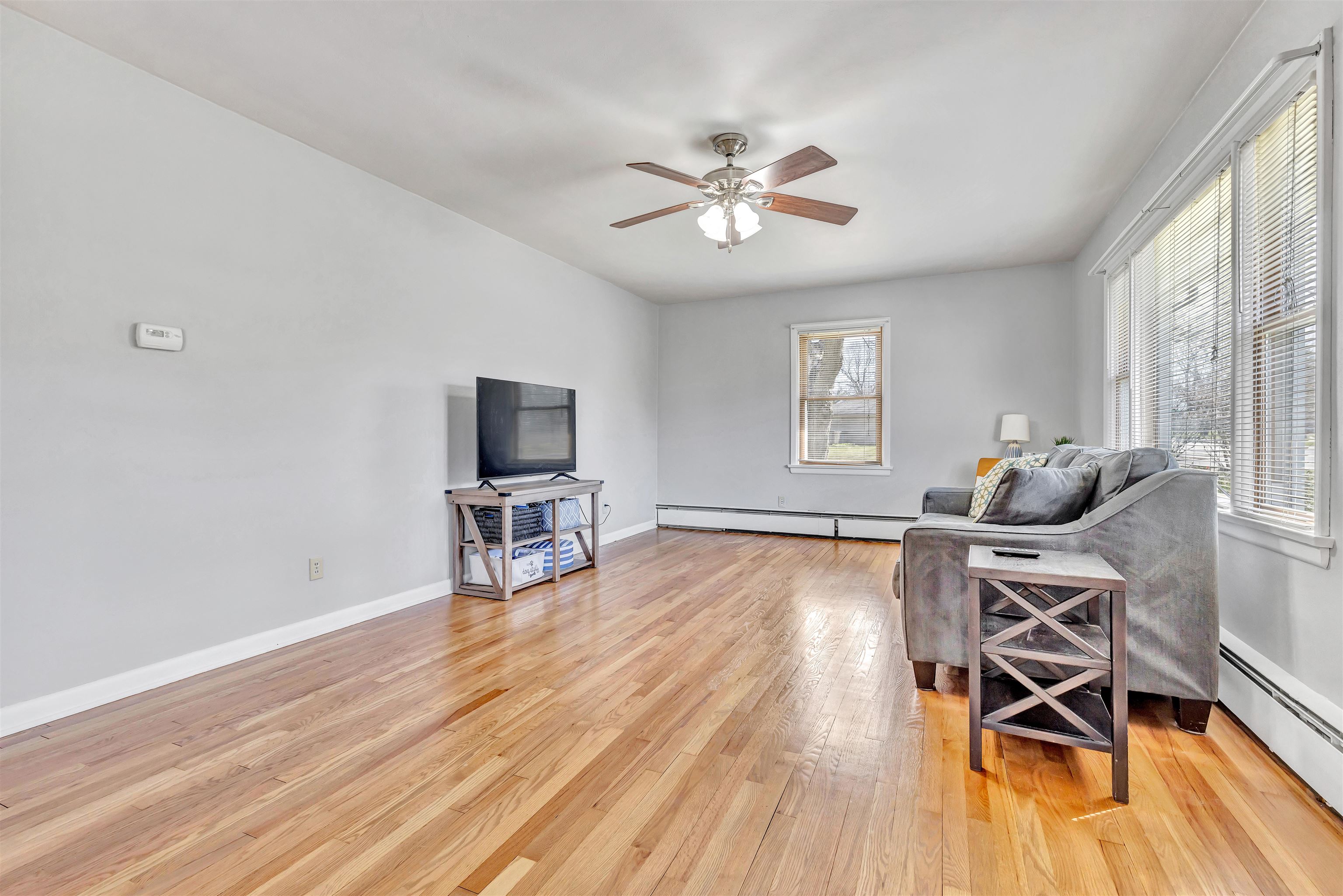 3620 Highcrest Road Rockford, IL 61107 - Photo 4 of 18 a view of a livingroom with furniture and wooden floor