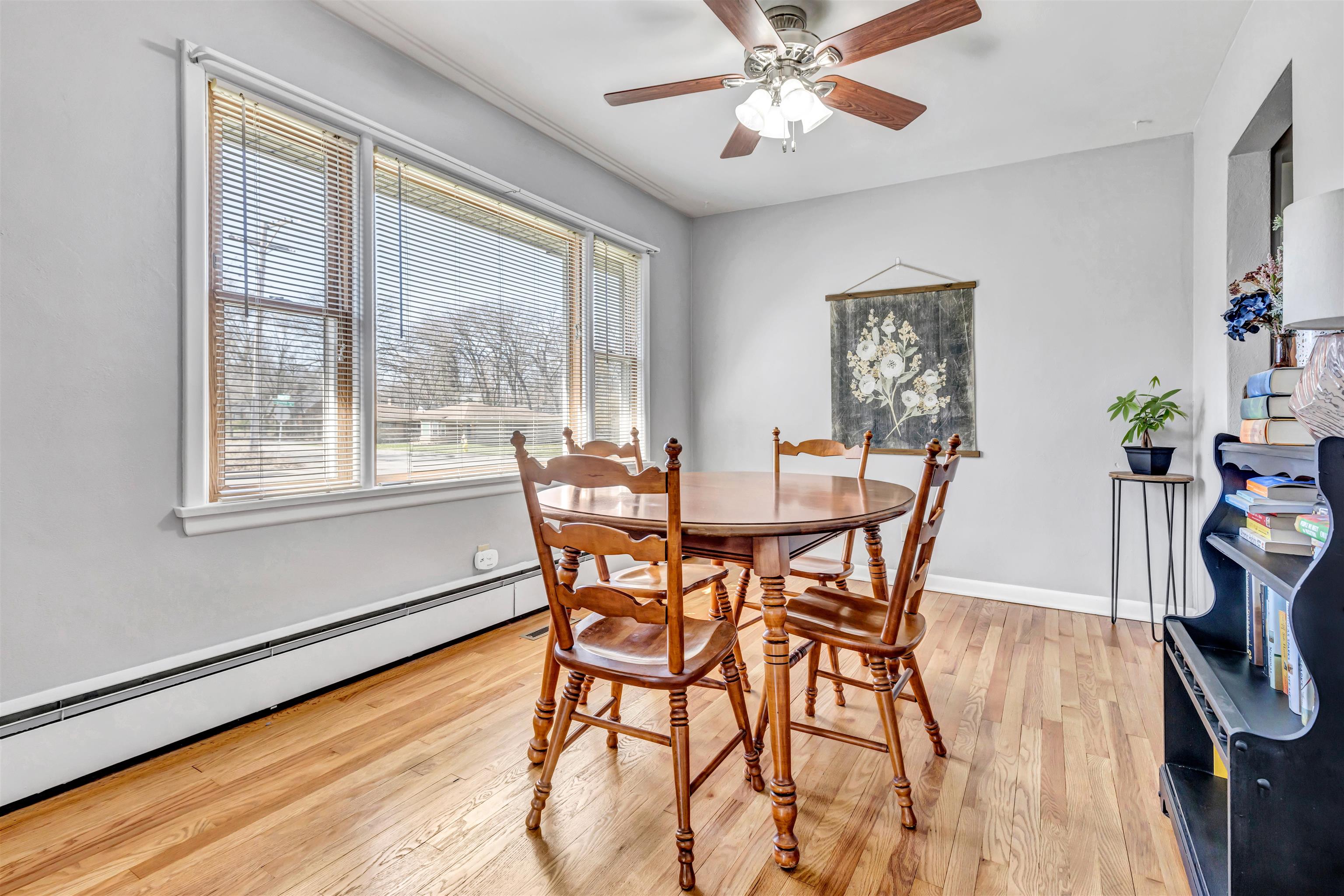 3620 Highcrest Road Rockford, IL 61107 - Photo 5 of 18 a view of a dining room with furniture window and wooden floor
